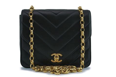 chanel bag black gold chain|chanel classic black bag price.